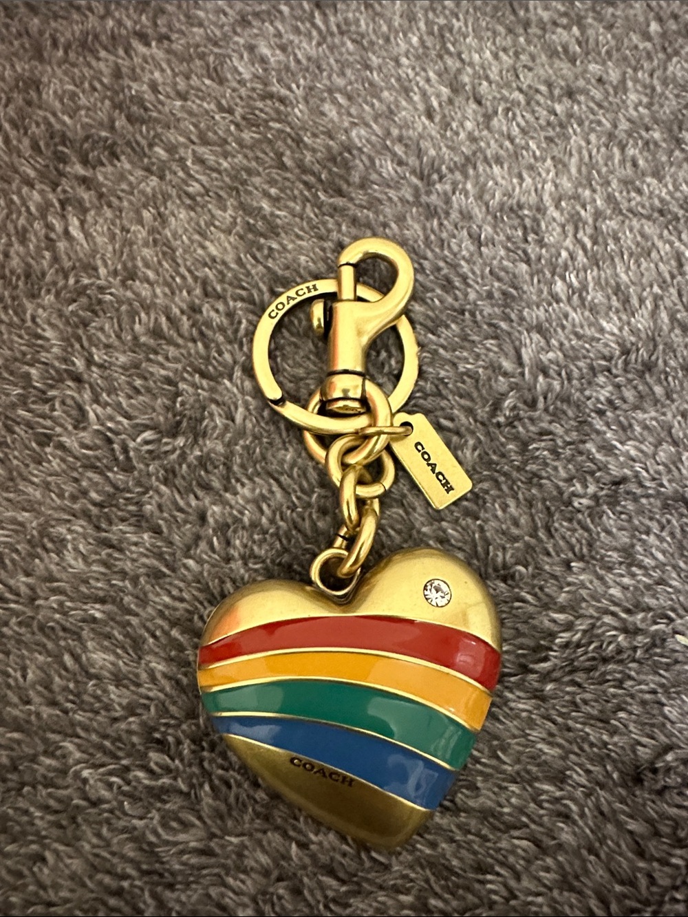 COACH Gold Heart bag charm with rainbow enamel stripes